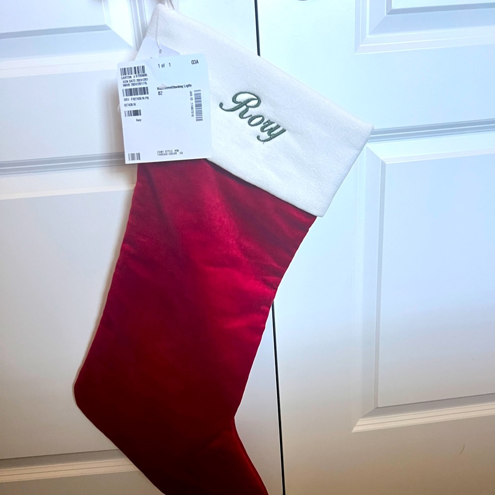 Red velvet Christmas Stocking personalized with “Rory”. From Pottery Barn 24 in